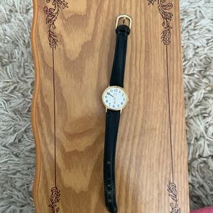 Timex watch gold outline and leather strap